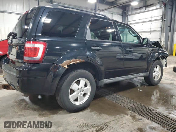2012 Ford Escape XLT z VIN 1FMCU9D74CKB91598, wystawiony jako Copart lot #51667805 z przebiegiem 182 152 mil mil oraz Szkoda całkowita • Salvage title. Historia ofert i sprzedaży dostępna na DreamBid. Obrazek 3.