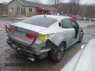 2016 Kia Optima LX Turbo with VIN 5XXGT4L1XGG006432, listed as a IAAI auction lot 41620038 with 137,210 mi miles. Bid and sale history available at carsss.com. Image 4.