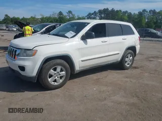 2012 Jeep Grand Cherokee Laredo with VIN 1C4RJFAG2CC176313, listed as a IAAI auction lot 42098127 with 162,556 mi miles. Bid and sale history available at carsss.com. Image 17.