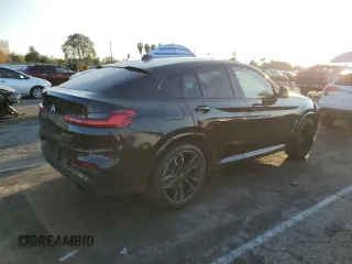 2020 BMW X4 M40i with VIN 5UX2V5C0XL9B53828, listed as a Copart auction lot 43190795 with 55,374 mi miles and Salvage title. Bid and sale history available at DreamBid. Image 3.