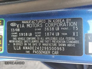 2009 Kia Rio LX with VIN KNADE243296500963, listed as a Copart auction lot 51061595 with 76,596 mi miles and Salvage Title. Bid and sale history available at carsss.com. Image 14.
