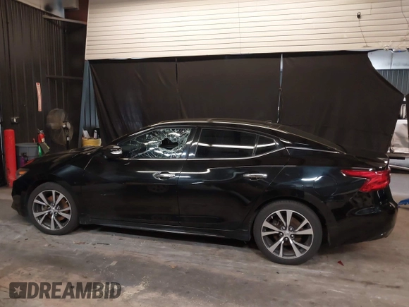 2017 Nissan Maxima SR with VIN 1N4AA6AP9HC366183, listed as a IAAI auction lot 39882700 with 94,132 mi miles and . Bid and sale history available at DreamBid. Image 13.