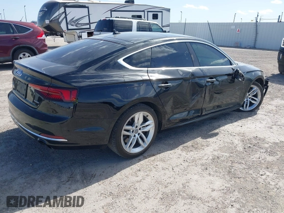 2019 Audi A5 Sportback Premium with VIN WAUANCF51KA061345, listed as a IAAI auction lot 41841741 with 84,732 mi miles. Bid and sale history available at carsss.com. Image 4.