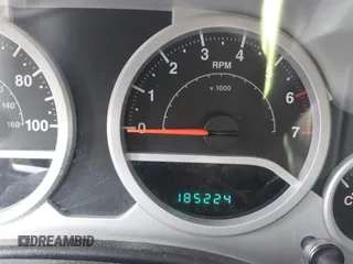 2008 Jeep Wrangler Unlimited Sahara with VIN 1J4GA59158L623784, listed as a IAAI auction lot 40365783 with 185,224 mi miles and . Bid and sale history available at DreamBid. Image 7.