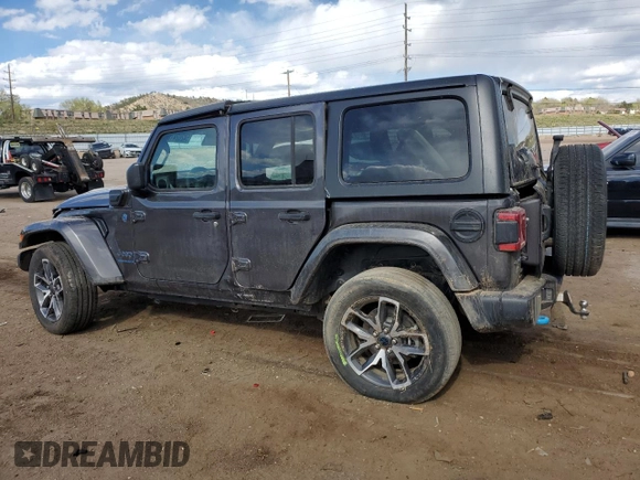 2024 Jeep Wrangler Sport S with VIN 1C4RJXN64RW202828, listed as a Copart auction lot 54202415 with 30,459 mi miles and Salvage title. Bid and sale history available at DreamBid. Image 2.