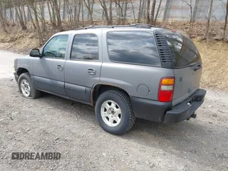 2003 Chevrolet Tahoe LS with VIN 1GNEK13Z13J287628, listed as a IAAI auction lot 42145379 with 141,957 mi miles and . Bid and sale history available at DreamBid. Image 3.