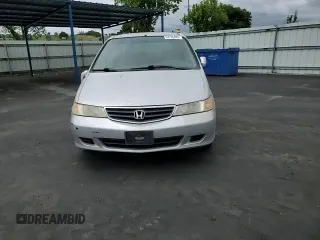 2002 Honda Odyssey EX-L with VIN 2HKRL18902H506828, listed as a Copart auction lot 53735625 with 214,446 mi miles and Salvage title. Bid and sale history available at DreamBid. Image 11.