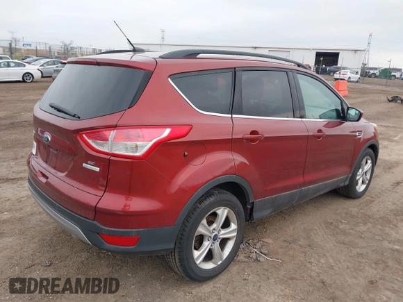 2014 Ford Escape SE with VIN 1FMCU0G99EUC38074, listed as a IAAI auction lot 42001227 with 209,467 mi miles. Bid and sale history available at carsss.com. Image 4.