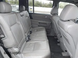 2011 Honda Pilot EX-L with VIN 5FNYF4H51BB080874, listed as a IAAI auction lot 42034400 with 194,080 mi miles and . Bid and sale history available at carsss.com. Image 8.