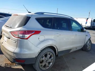 2016 Ford Escape Titanium with VIN 1FMCU0J96GUB36680, listed as a IAAI auction lot 41446705 with 137,926 mi miles. Bid and sale history available at carsss.com. Image 12.