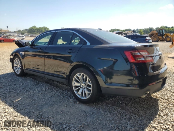 2015 Ford Taurus Limited with VIN 1FAHP2F84FG118324, listed as a Copart auction lot 63366325 with 89,306 mi miles and Salvage title. Bid and sale history available at DreamBid. Image 2.