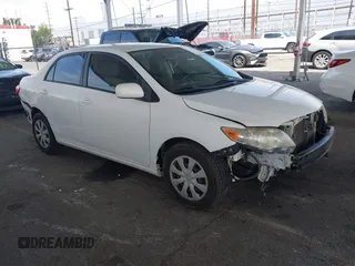 2011 Toyota Corolla L with VIN JTDBU4EE9B9131113, listed as a IAAI auction lot 42028423 with 191,157 mi miles. Bid and sale history available at carsss.com. Image 1.