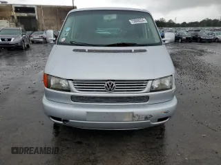 2003 Volkswagen EuroVan с VIN WV2KB47093H041606, выставлен на аукционе Copart как лот 73808224 с пробегом 228 496 миль миль и Чистый • Clean title. История ставок и продаж доступна на DreamBid. Изображение 5.
