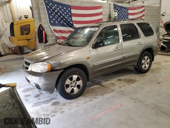 2001 Mazda Tribute LX with VIN 4F2CU08101KM05943, listed as a Copart auction lot 84077694 with 137,937 mi miles and Salvage Title. Bid and sale history available at DreamBid. Image 1.