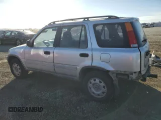 2000 Honda CR-V LX with VIN JHLRD1741YC030308, listed as a Copart auction lot 84634014 with 254,772 mi miles and Salvage Title. Bid and sale history available at carsss.com. Image 2.