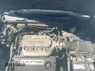 2005 Honda Accord LX with VIN 1HGCM66375A027799, listed as a IAAI auction lot 41904472 with 214,064 mi miles and . Bid and sale history available at DreamBid. Image 19.