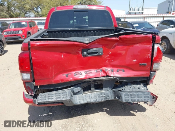 2018 Toyota Tacoma SR5 with VIN 5TFAZ5CN0JX063350, listed as a IAAI auction lot 41829396 with 61,155 mi miles and . Bid and sale history available at DreamBid. Image 6.