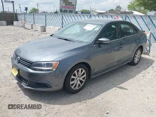 2013 Volkswagen Jetta SE with VIN 3VWDX7AJXDM255977, listed as a IAAI auction lot 42194447 with 120,921 mi miles and . Bid and sale history available at DreamBid. Image 2.