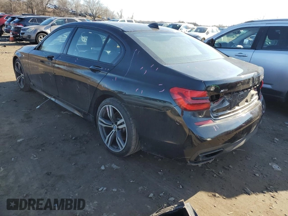 2018 BMW 7 Series 740i xDrive with VIN WBA7E4C56JGV28100, listed as a Copart auction lot 41079924 with 63,891 mi miles. Bid and sale history available at carsss.com. Image 2.