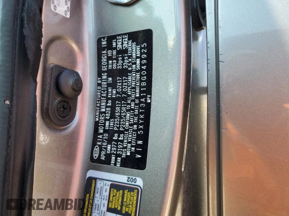 2011 Kia Sorento LX with VIN 5XYKT3A11BG049925, listed as a Copart auction lot 51113785 with 126,778 mi miles and Salvage Title. Bid and sale history available at DreamBid. Image 12.