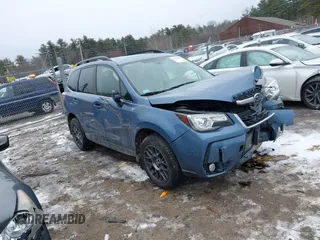 2018 Subaru Forester Touring with VIN JF2SJGWC0JH532501, listed as a IAAI auction lot 41478743 with 98,780 mi miles. Bid and sale history available at carsss.com. Image 1.