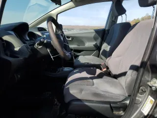 2013 Honda Fit с VIN JHMGE8H34DC080256, выставлен на аукционе Copart как лот 45559375 с пробегом 126 582 миль миль и Списание • Salvage title. История ставок и продаж доступна на DreamBid. Изображение 7.