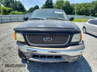 2004 Ford F-150 XL with VIN 2FTRX18W04CA13170, listed as a Copart auction lot 60932775 with 233,249 mi miles and Salvage title. Bid and sale history available at DreamBid. Image 5.