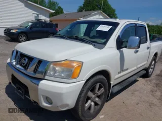 2010 Nissan Titan SE with VIN 1N6BA0ED4AN323907, listed as a IAAI auction lot 42113512 with 198,530 mi miles. Bid and sale history available at carsss.com. Image 20.