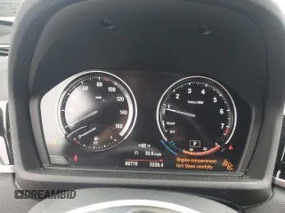 2018 BMW X1 xDrive28i z VIN WBXHT3C30J5L30276, wystawiony jako Copart lot #58903045 z przebiegiem 86 778 mil mil oraz Szkoda całkowita • Salvage title. Historia ofert i sprzedaży dostępna na DreamBid. Obrazek 9.