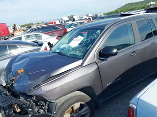 2016 Jeep Compass Sport with VIN 1C4NJDBB0GD511414, listed as a IAAI auction lot 40390327 with 132,120 mi miles. Bid and sale history available at carsss.com. Image 2.