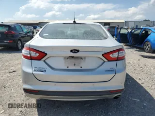 2013 Ford Fusion SE Hybrid z VIN 3FA6P0LU3DR336838, wystawiony jako Copart lot #56205445 z przebiegiem 209 164 mil mil oraz Czysty tytuł • Clean title. Historia ofert i sprzedaży dostępna na DreamBid. Obrazek 6.