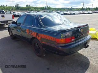 1996 Toyota Camry LE with VIN 4T1BF12K2TU863175, listed as a IAAI auction lot 42020895 with 245,443 mi miles and . Bid and sale history available at DreamBid. Image 3.
