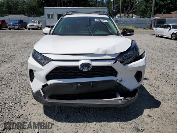 2021 Toyota RAV4 Hybrid LE with VIN JTMM6RFVXMD018561, listed as a Copart auction lot 60475965 with 56,074 mi miles and Salvage title. Bid and sale history available at DreamBid. Image 5.