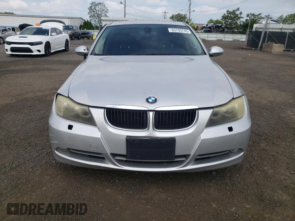 2007 BMW 3 Series 328xi with VIN WBAVC73527KP32168, listed as a Copart auction lot 63793745 with 145,786 mi miles and Salvage title. Bid and sale history available at DreamBid. Image 5.
