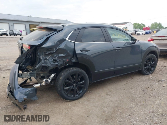 2023 Mazda CX-30 S Carbon Edition with VIN 3MVDMBCM4PM577619, listed as a IAAI auction lot 42219801 with 24,784 mi miles and . Bid and sale history available at DreamBid. Image 6.