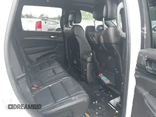 2021 Jeep Grand Cherokee 80th Anniversary with VIN 1C4RJFBG2MC568028, listed as a IAAI auction lot 42381104 with 51,027 mi miles and . Bid and sale history available at DreamBid. Image 8.