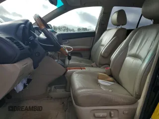 2007 Lexus RX 400h z VIN JTJGW31U472004368, wystawiony jako Copart lot #48008365 z przebiegiem 166 460 mil mil oraz Czysty tytuł • Clean title. Historia ofert i sprzedaży dostępna na DreamBid. Obrazek 7.