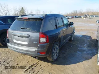 2017 Jeep Compass Latitude with VIN 1C4NJDEB0HD190200, listed as a IAAI auction lot 41733462 with 77,374 mi miles and . Bid and sale history available at DreamBid. Image 4.