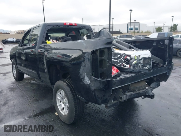 2017 Chevrolet Silverado 1500 LT with VIN 1GCRCREC5HZ113150, listed as a IAAI auction lot 41826582 with 50,565 mi miles and . Bid and sale history available at DreamBid. Image 3.