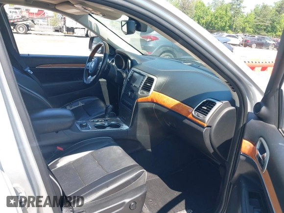 2011 Jeep Grand Cherokee Overland with VIN 1J4RR6GGXBC526649, listed as a IAAI auction lot 42162327 with 185,129 mi miles and . Bid and sale history available at DreamBid. Image 5.