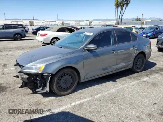 2014 Volkswagen Jetta SE with VIN 3VWD17AJ2EM322087, listed as a Copart auction lot 62571155 with 71,884 mi miles and Salvage title. Bid and sale history available at DreamBid. Image 1.