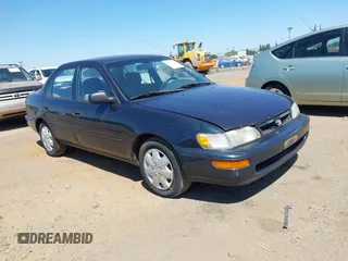 1997 Toyota Corolla z VIN 1NXBA02E3VZ517237, wystawiony jako IAAI lot #42772332 z przebiegiem 185 045 mil mil oraz . Historia ofert i sprzedaży dostępna na DreamBid. Obrazek 1.