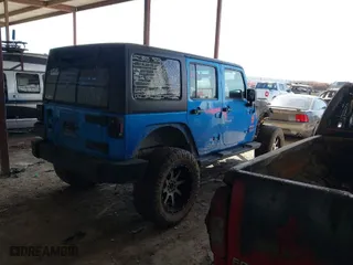 2010 Jeep Wrangler Unlimited Sport with VIN 1J4BA3H14AL213452, listed as a IAAI auction lot 41789188 with 1 mi miles. Bid and sale history available at carsss.com. Image 4.