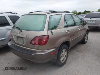 2000 Lexus RX 300 with VIN JT6HF10U5Y0134886, listed as a IAAI auction lot 42068102 with 156,237 mi miles. Bid and sale history available at carsss.com. Image 4.
