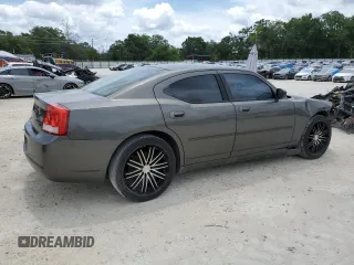 2009 Dodge Charger SE z VIN 2B3KA43DX9H530580, wystawiony jako Copart lot #58381375 z przebiegiem 300 292 mil mil oraz Szkoda całkowita • Salvage title. Historia ofert i sprzedaży dostępna na DreamBid. Obrazek 3.