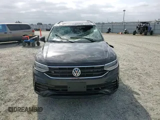 2024 Volkswagen Tiguan SE R-Line Black z VIN 3VVCB7AX8RM072281, wystawiony jako Copart lot #54356745 z przebiegiem 10 562 mil mil oraz Szkoda całkowita • Salvage title. Historia ofert i sprzedaży dostępna na DreamBid. Obrazek 15.