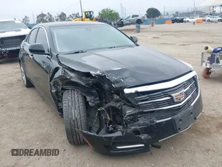 2016 Cadillac ATS Standard RWD z VIN 1G6AA5RA3G0102965, wystawiony jako IAAI lot #42100407 z przebiegiem 116 476 mil mil oraz . Historia ofert i sprzedaży dostępna na DreamBid. Obrazek 1.