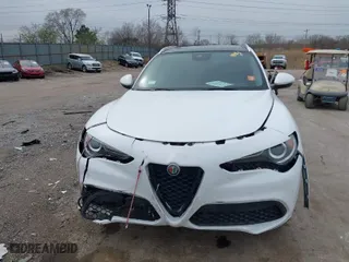 2020 Alfa Romeo Stelvio Ti with VIN ZASPAKBN6L7C92398, listed as a IAAI auction lot 41924883 with 73,683 mi miles. Bid and sale history available at carsss.com. Image 12.