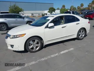 2009 Acura TSX with VIN JH4CU26629C003923, listed as a IAAI auction lot 42488628 with 213,331 mi miles and . Bid and sale history available at DreamBid. Image 2.