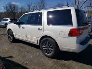 2015 Lincoln Navigator with VIN 5LMJJ2JT7FEJ14619, listed as a Copart auction lot 47436515 with 49,600 mi miles and Salvage Title. Bid and sale history available at carsss.com. Image 2.